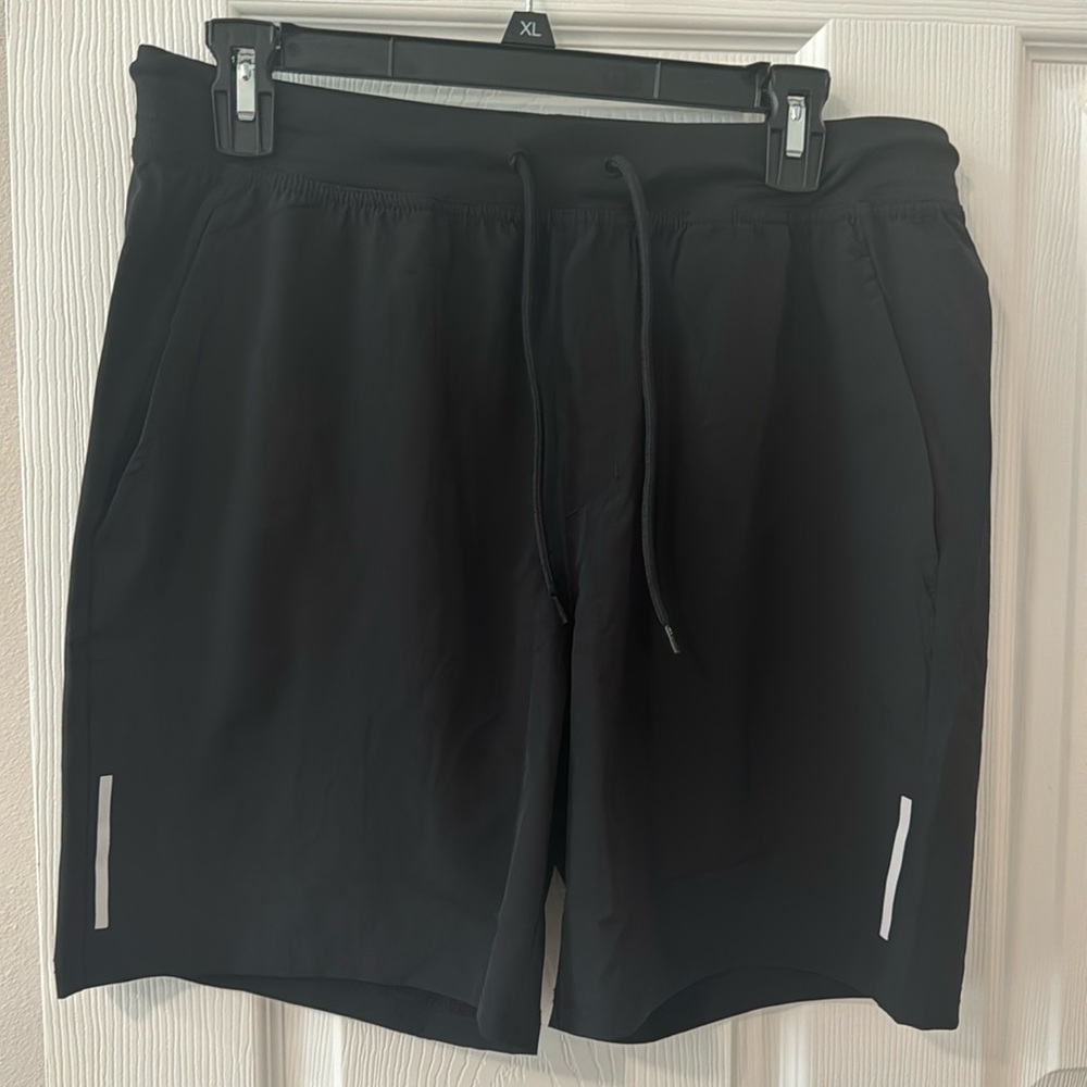 Men’s black shorts. Only tried on.